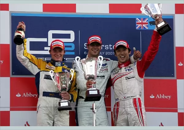 GP2 Series: The podium: Mike Conway Super Nova International, second; Andreas Zuber iSport International, race winner; Kazuki Nakajima Dams, third