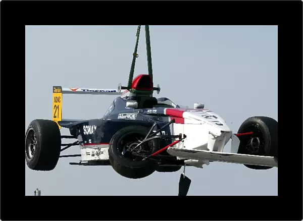 Formula BMW ADAC Championship: The car of Jan Charouz, Eifelland Racing, hanging in the air as it is lifted from the track