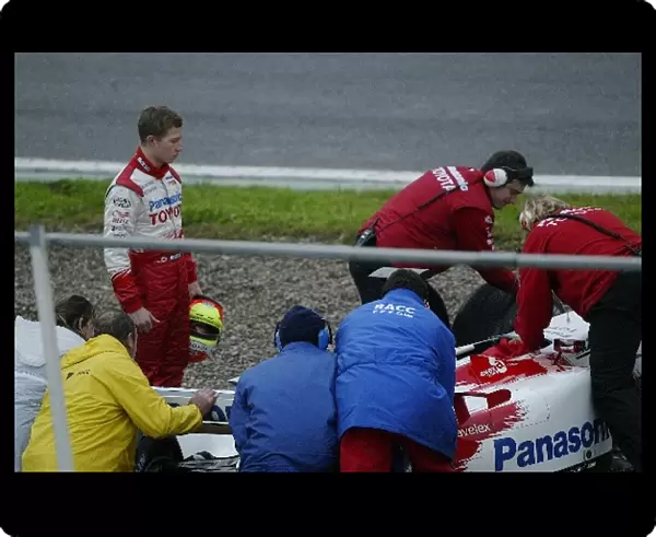 Formula One Testing: Ryan Briscoe puts the Toyota into the Gravel trap