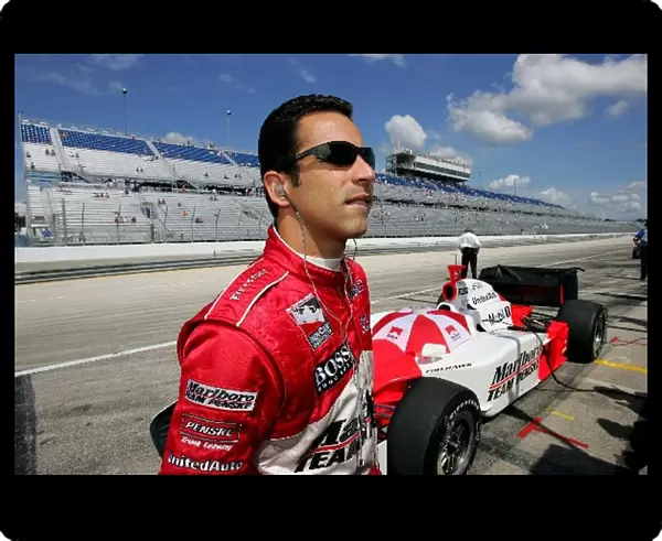 Indy Racing League: Helio Castroneves watches qualifying for the Menards AJ Foyt Indy 225, The Milwaukee Mile, Milwaukee, WI, 25, July, 2004. 04irl09