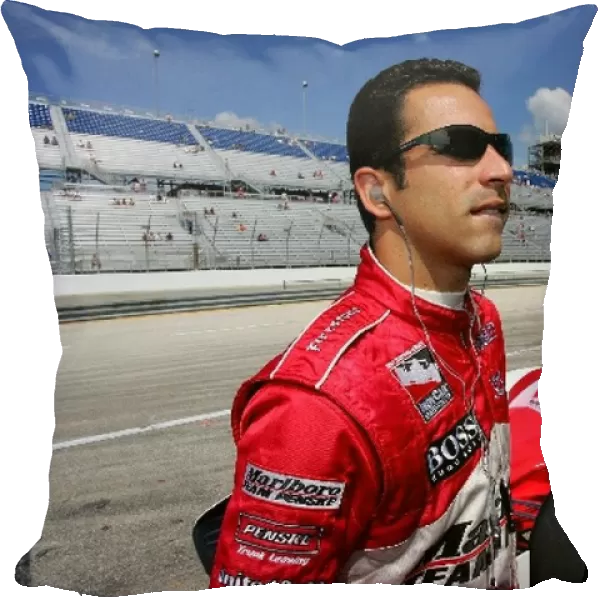Indy Racing League: Helio Castroneves watches qualifying for the Menards AJ Foyt Indy 225, The Milwaukee Mile, Milwaukee, WI, 25, July, 2004. 04irl09