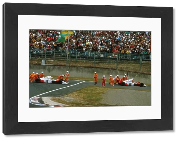 Formula One World Championship: Team-mates Ayton Senna and Alain Prost McLaren MP4  /  5, crash out of the race