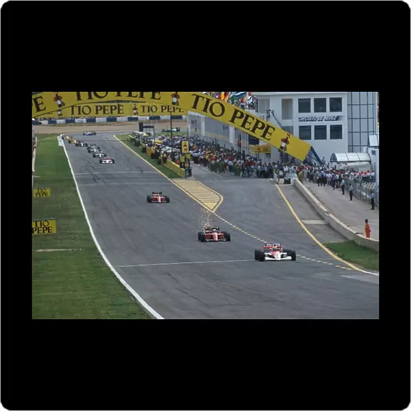 Formula One World Championship: Ayrton Senna leads the eventual race winner Alain Prost