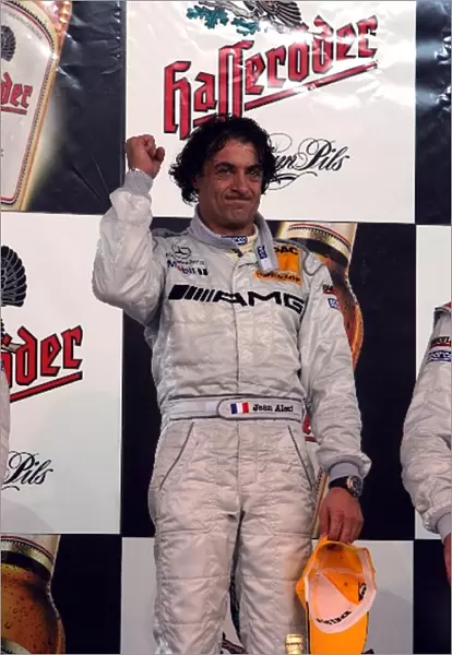 DTM Championship: Race winner Jean Alesi, AMG Mercedes Benz, celebrates on the podium