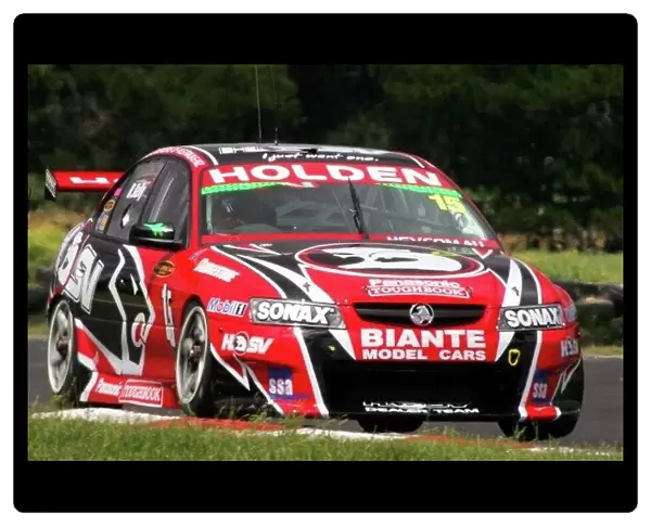 05av812. Rick Kelly (AUS) HSV Commodore, on his way to 3rd position.
