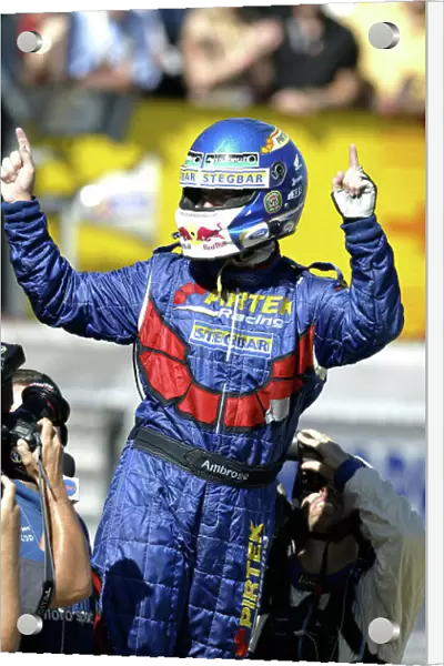 2004 Australian V8 Supercar Championship Clipsal 500, Adelaide, Australia. 21st March 2004. Ford driver Marcos Ambrose waves to his fans after winning race 2. World Copyright: Mark Horsburgh / LAT Photographic ref: Digital Image Only