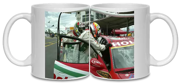 2002 Australian V8 Supercar Championship R9 QLD 500 Queensland, Australia.15th September 2002 Holden drives Russell Ingall(right) and Steven Richards driver change