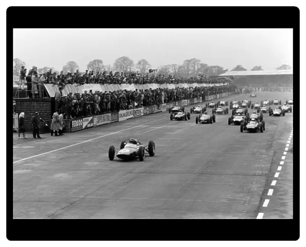 Silverstone, Great Britain. 10-12 May 1962: Jim Clark leads Richie Ginther, Bruce McLaren, Innes Ireland and Graham Hill at the start