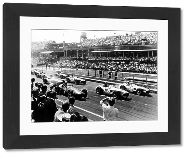 1955 British Grand Prix: Stirling Moss, Juan Manuel Fangio and Jean Behra lead Karl Kling and Piero Taruffi at the start