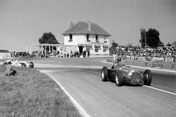 Reims, France. 1 July 1951: Giuseppe Farina, 5th position, leads Johnny Claes