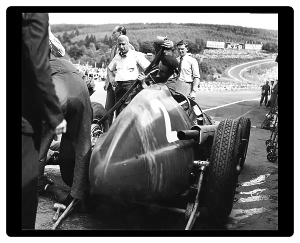 1951 Belgian Grand Prix: Juan Manuel Fangio in the pits