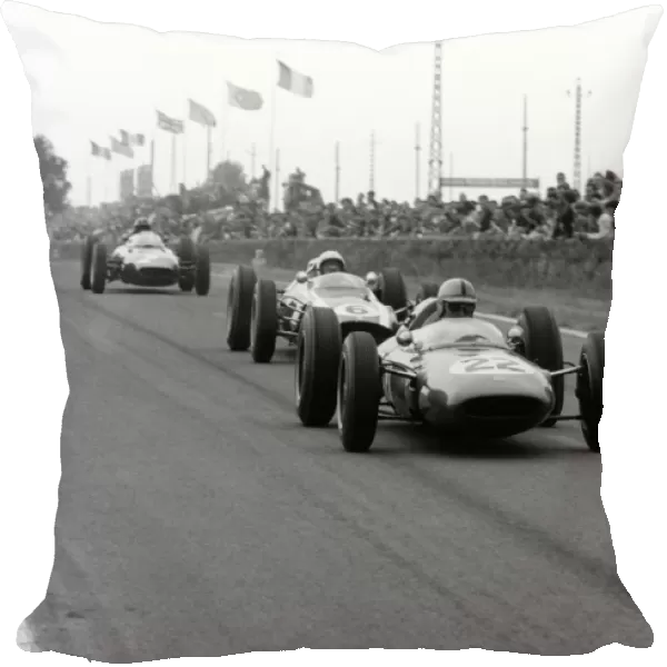 1962 Reims Grand Prix: Jack Brabham leads Bruce McLaren and Graham Hill. They finished in 4th, 1st and 2nd position respectively