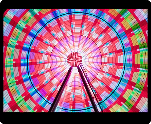Long Exposure Photograph Showcasing The Many Color Combinations The Big Wheel Produces At Night; Seattle, Washington, United States Of America