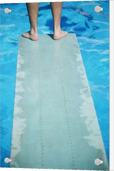 Feet On The Edge Of A Diving Board