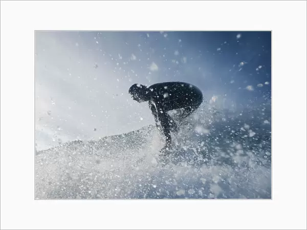 A Man Surfing Off Bunker Beach; Tarifa, Cadiz, Andalusia, Spain