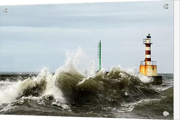 Lighthouse And Splashing Waves; Amble, Northumberland, England