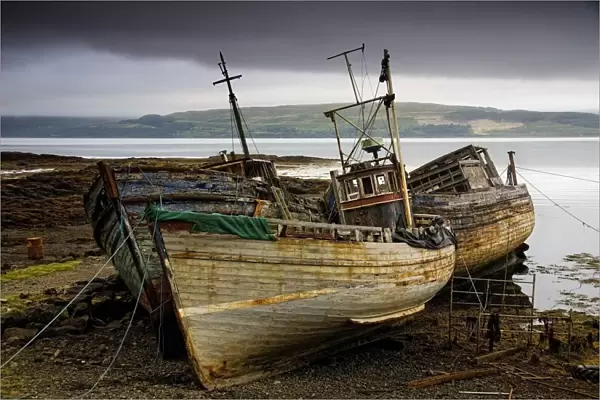 Scotland; Three Boats On Shore