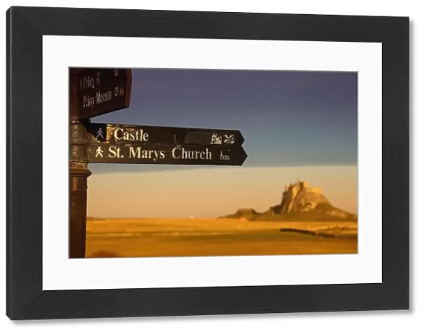 A Sign Post Pointing To A Castle And St. Marys Church On The Tidal Island, Also Known As Holy Island; Lindisfarne, Northumberland, England