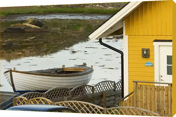 Boat And Traditional House On Flaton Island