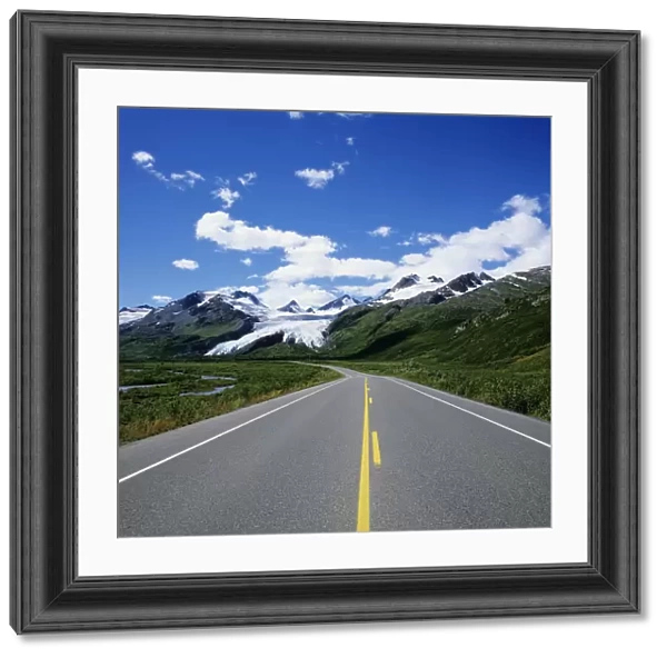 USA, Blue Skies And Mountain Peaks In Distance; Alaska, Richardson Highway Leading To Worthington Glacier
