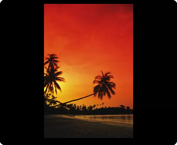 Indonesia, Tourist resort and beach at sunset; Bintan Island