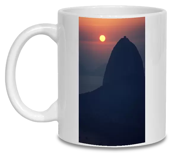Brazil, Rio De Janeiro, Sugarloaf Mountain Silhouetted At Sunset