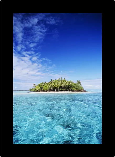 French Polynesia, Tahiti, Turquoise water and blue sky; Bora Bora, Motu Island in Distance