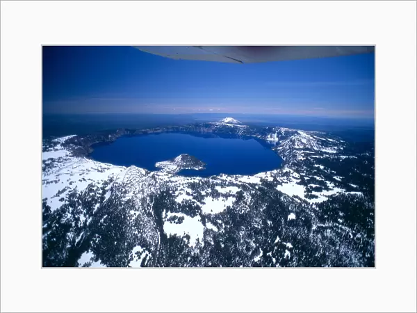 Oregon, Crater Lake, Aerial Overview, Snow Scattered, Clear Blue Sky Background A51H
