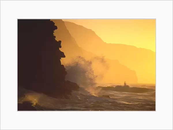 Hawaii, Kauai, Na Pali Coast At Sunset From Haena, Crashing Waves Against Rocks, Misty Yellow Sky