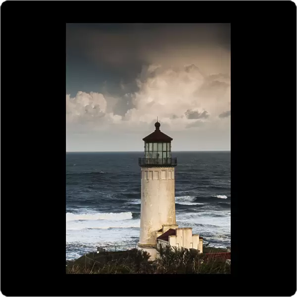 North Head Lighthouse Complemented By Clouds And Surf; Ilwaco, Washington, United States Of America