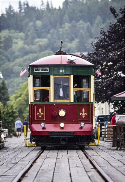 The Astoria Trolley Running Along The Riverfront; Astoria, Oregon, United States Of America