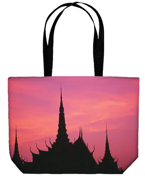 Cambodia, Phnom Phen, Silhouette Of Palace Architecture At Sunset