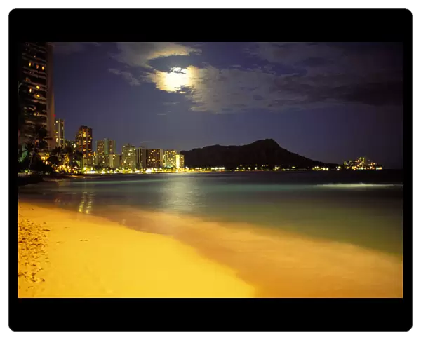 Hawaii, Oahu, Diamond Head At Night, Moon Hidden Behind Clouds, Bright Yellow Sand Skyline Illuminated