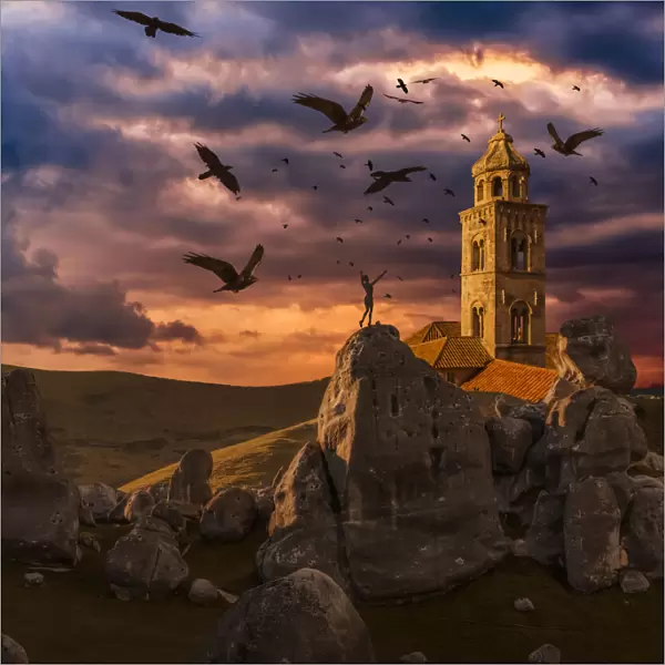 Crows flying towards a church tower