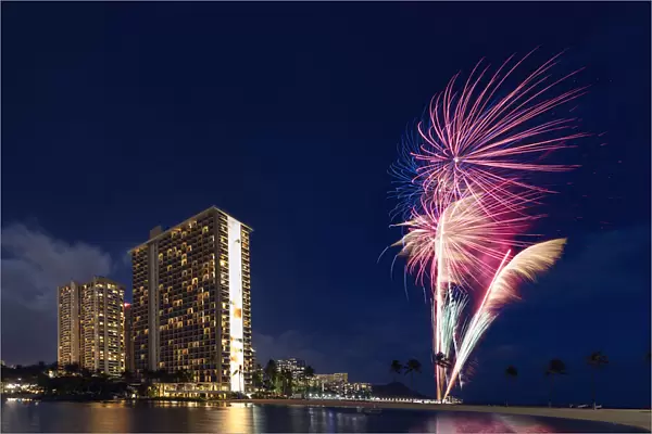 Fireworks at sunset, Waikiki Honolulu, Oahu, Hawaii, USA