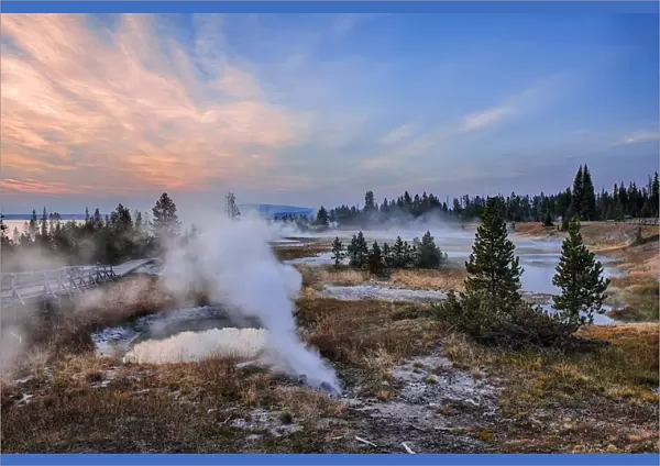 Sunrise at West Thumb Geyser Basin with Yellowstone Lake in the background in Autumn, Yellowstone National Park, Wyoming, USA