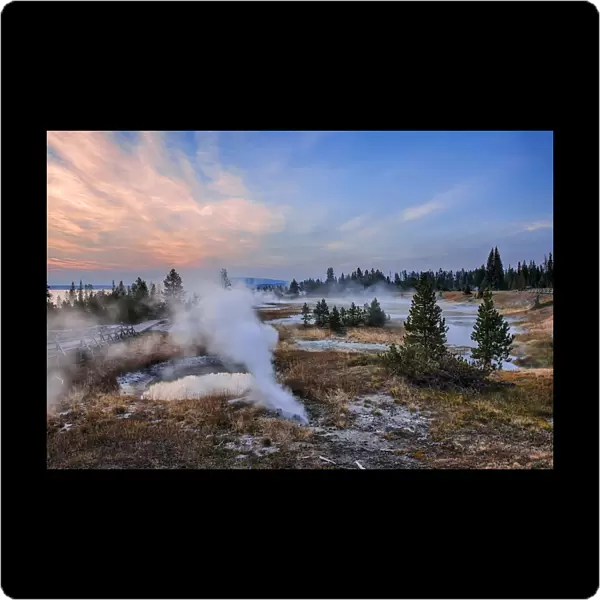 Sunrise at West Thumb Geyser Basin with Yellowstone Lake in the background in Autumn, Yellowstone National Park, Wyoming, USA