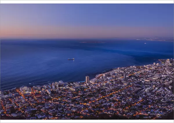 View of Cape Town Skyline and Atlantic Ocean coast at dusk, South Africa