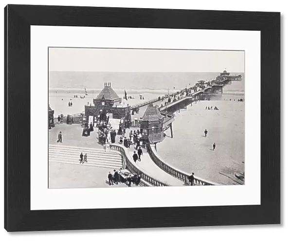 The pier at Skegness, Lincolnshire, England, seen here in the 19th century. From Around The Coast, An Album of Pictures from Photographs of the Chief Seaside Places of Interest in Great Britain and Ireland published London, 1895, by George Newnes Limited