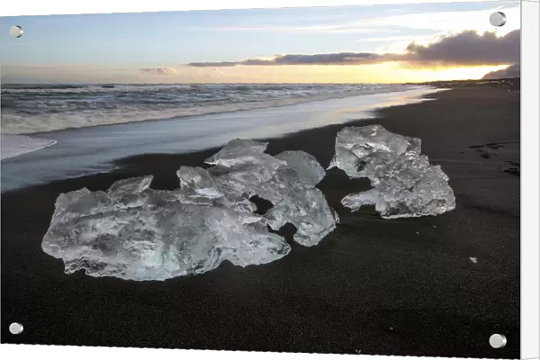 Ice from the Jokulsarlon glacier lagoon washed up on a black sand beach