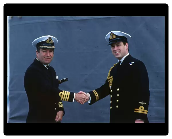 Prince Andrew Duke of York October 1988 lshaking hands with a unknown naval officer