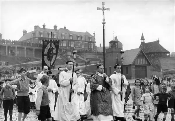 The clergy, the Crucifer, the torch bearers and the choir of St Georges Parish church