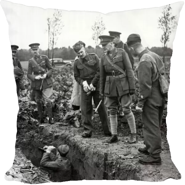 Lieutenant General Sir John Dill inspecting soldiers at work digging trenches in France