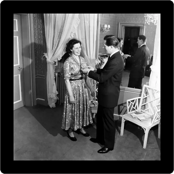 Mrs. Campbell with Hardy Anis clothes designer. March 1953 D1341
