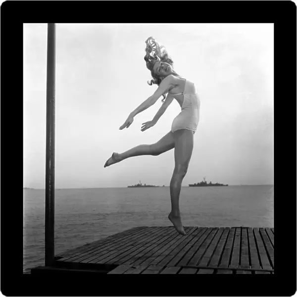 Dancing. Annie Mercur, The Queen of Paris seen here dancing on the Sards at Cannes