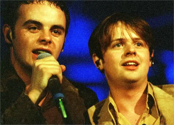 Pop duo Ant and Dec singing on stage at the Glasgow Royal Concert Hall