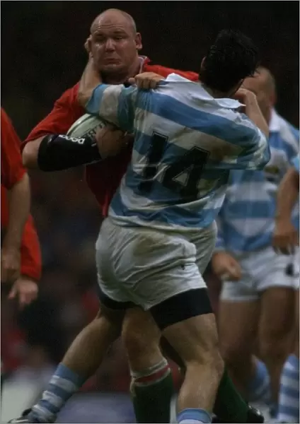 Craig Quinell breaks through in October 1999 during the Wales v Argentina match