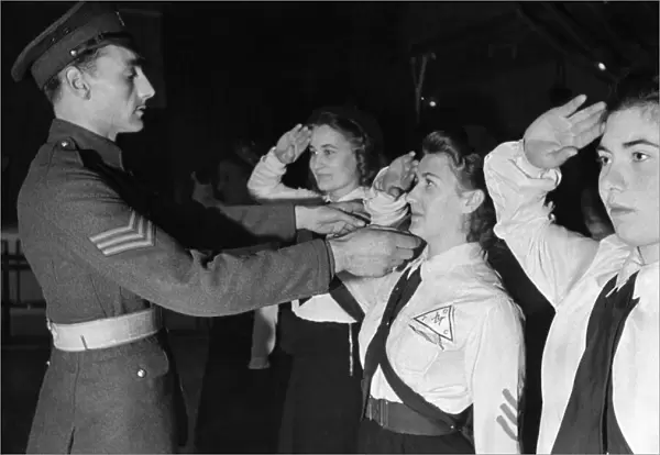 Sargeant Shorter of the Coldstream Guards instructing the new recruits of the girls