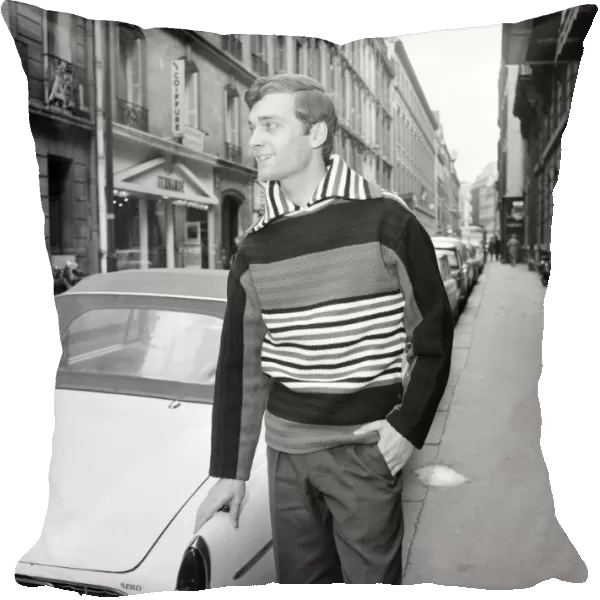 Men modelling the latest 1963 menswear designs in the streets of Paris. April 1963