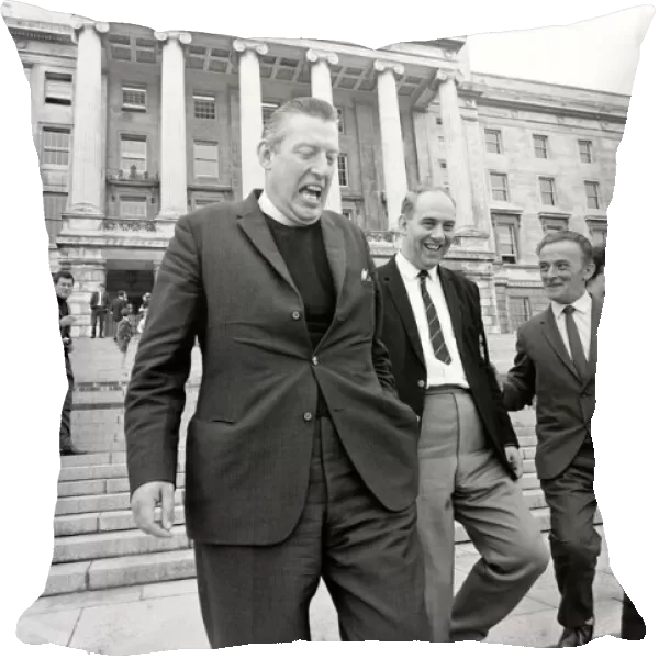 The Reverend Ian Paisley and Major Ronald Bunting leave the Stormont building in Belfast